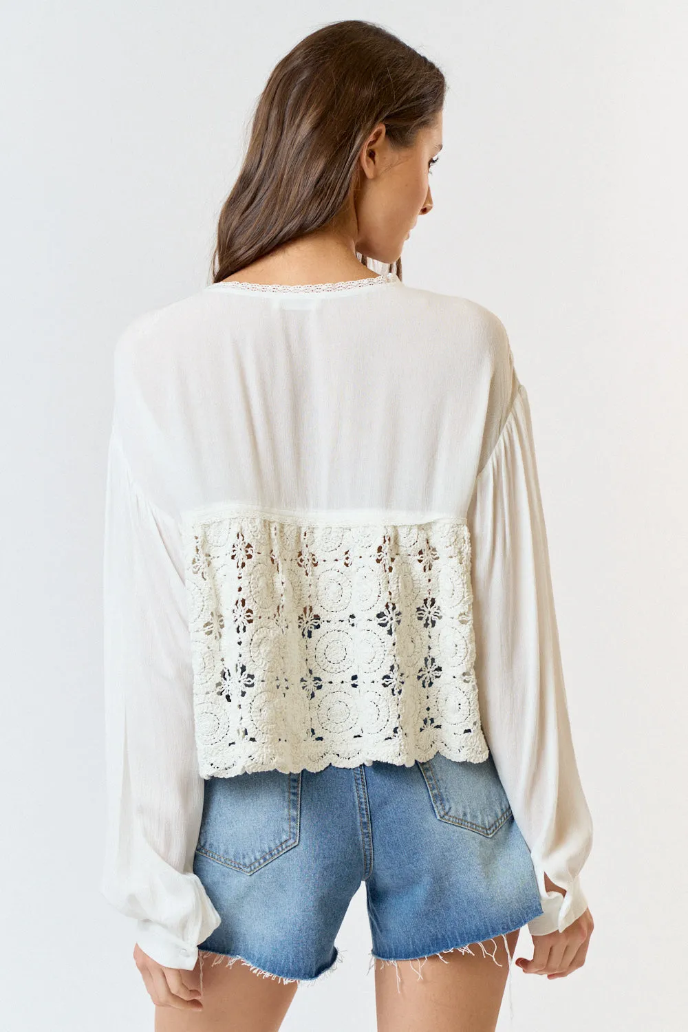 Sure! Here are a few optimized title suggestions for your Boho Crochet Blouse:

1. Chic Bohemian Crochet Blouse with Lace Detailing
2. Stylish Boho Crochet Top - Perfect for Summer Days
3. Trendy Bohemian Crochet Blouse - Lightweight and Breezy
4. Elegant Boho-Inspired Crochet Blouse - Ideal for Casual Wear
5. Fashionable Crochet Blouse with Boho Flair - Great for Layering

Feel free to choose any of these or mix and match elements to create the perfect title for your product!