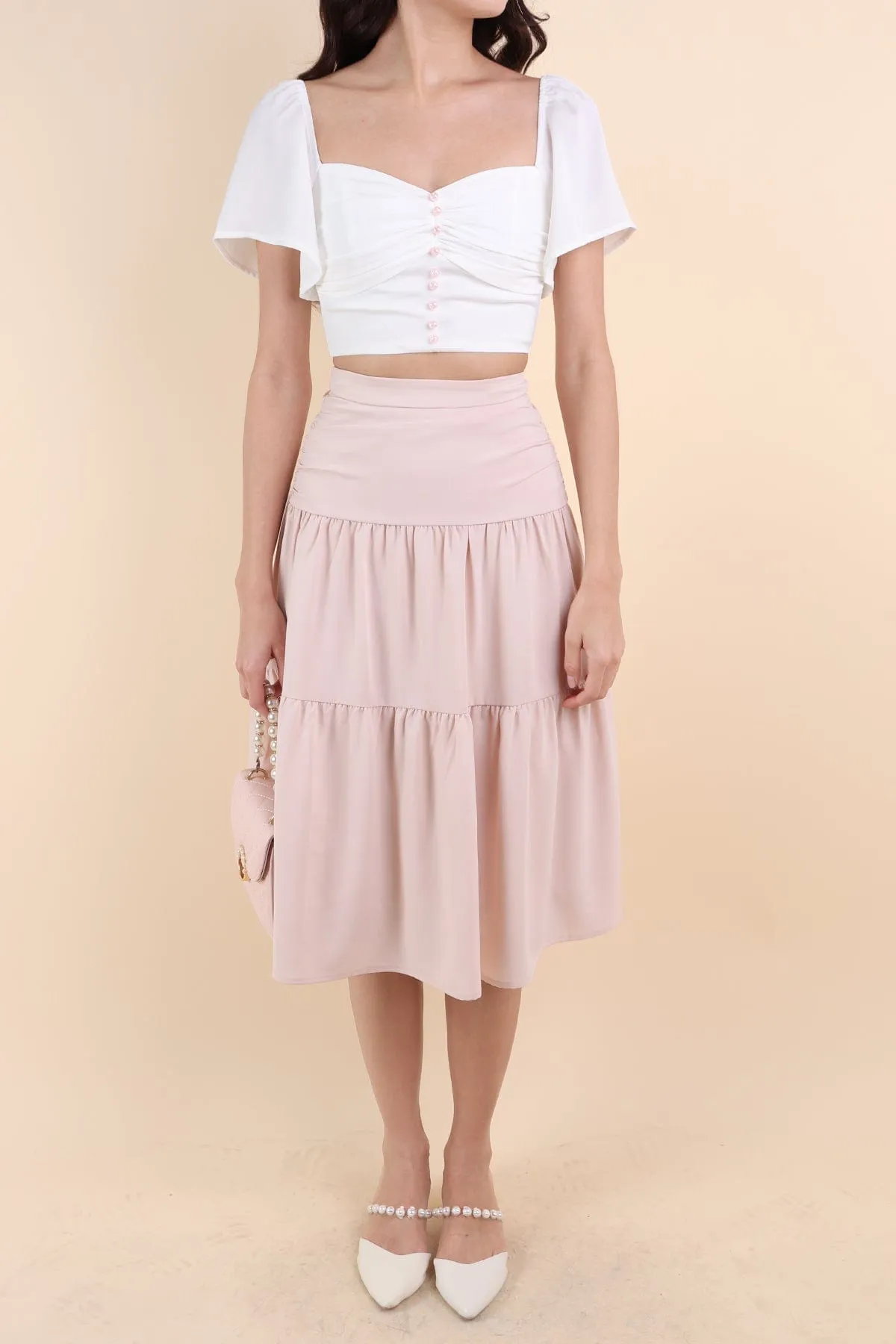 Elegant Blush Midi Skirt - Cecil Tiered Design